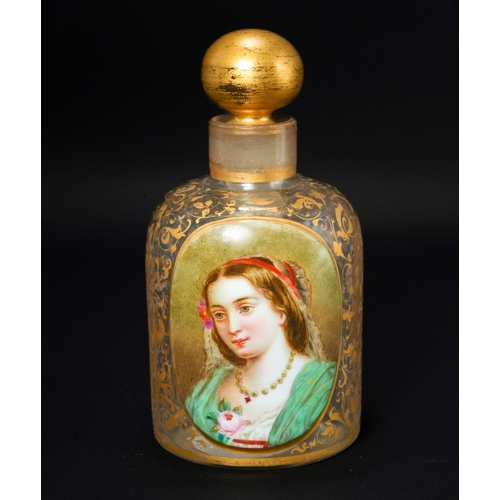 552 - A 19th century continental glass scent bottle, having a raised oval plaque enameled with a portrait ... 