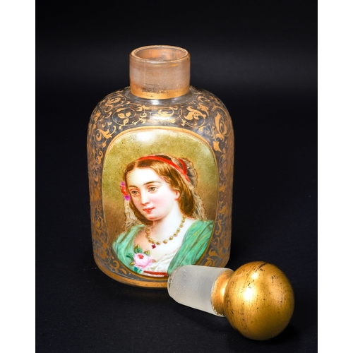 552 - A 19th century continental glass scent bottle, having a raised oval plaque enameled with a portrait ... 