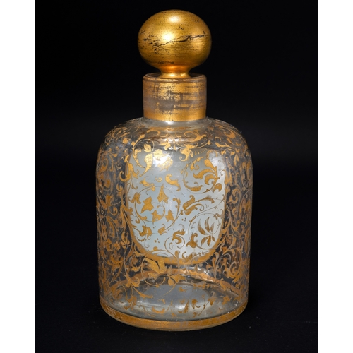 552 - A 19th century continental glass scent bottle, having a raised oval plaque enameled with a portrait ... 