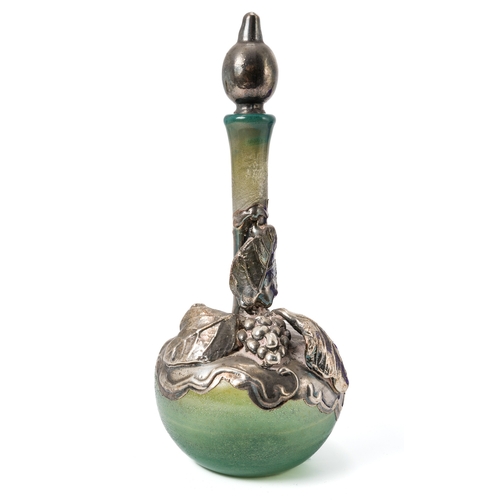 555 - A silver mounted green glass scent bottle, applied with fruiting vines, approx 12.5cm high; a globul... 