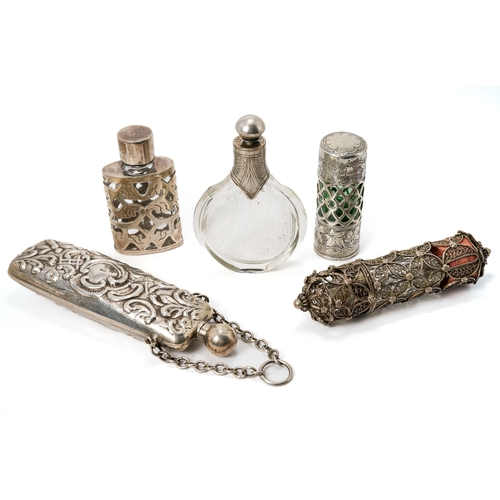 556 - A silver Victorian scent bottle, for a chatelaine, approx 9cm long; three silver mounted glass scent... 