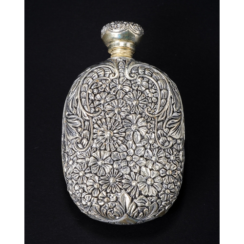 558 - A continental 835 silver scent bottle, cast with flowers and leaves, screw lid, approx 7.5cm, gross ... 