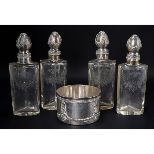 559 - A set of four French silver-mounted engraved glass scent-bottles, first quarter 20th Century, the fo... 