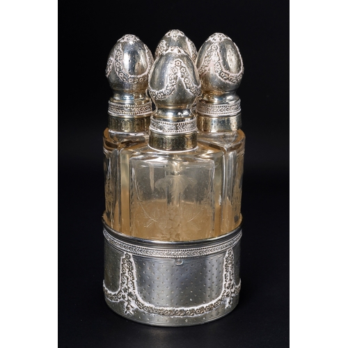 559 - A set of four French silver-mounted engraved glass scent-bottles, first quarter 20th Century, the fo... 