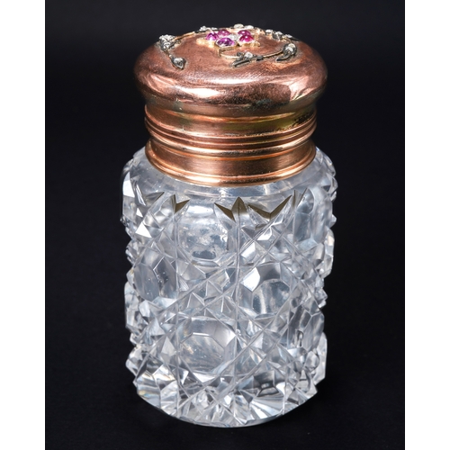 560 - A 9ct rose gold and cut glass scent bottle, the hinged cover set with rose cut diamonds and cabochon... 