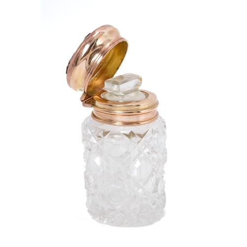 560 - A 9ct rose gold and cut glass scent bottle, the hinged cover set with rose cut diamonds and cabochon... 