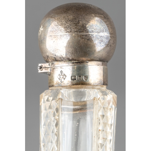 568 - A late Victorian silver mounted cut glass scent flask of tapered form, the hinged cover engraved wit... 