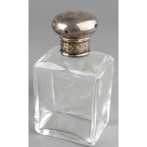 571 - A collection of nine glass scent bottles including two cut glass globular bottles with screw-on silv... 