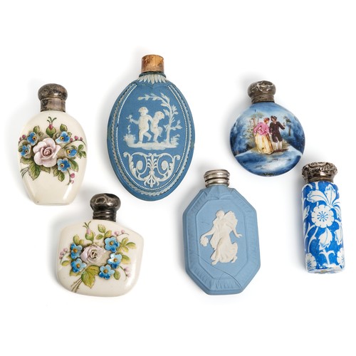 574 - A collection of 19th and 20th Century porcelain scent bottles, including an oval blue jasperware exa... 