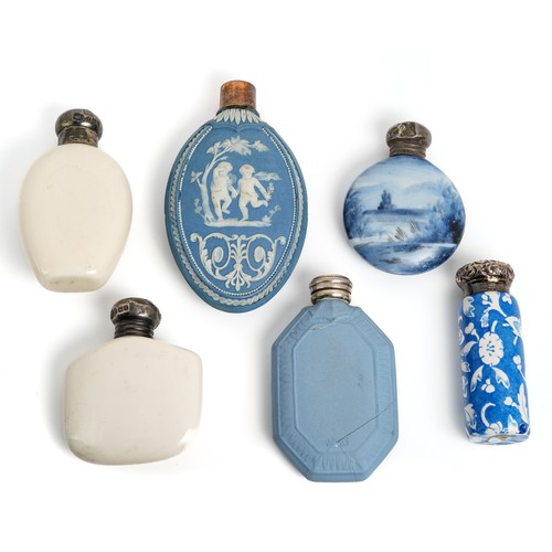 574 - A collection of 19th and 20th Century porcelain scent bottles, including an oval blue jasperware exa... 