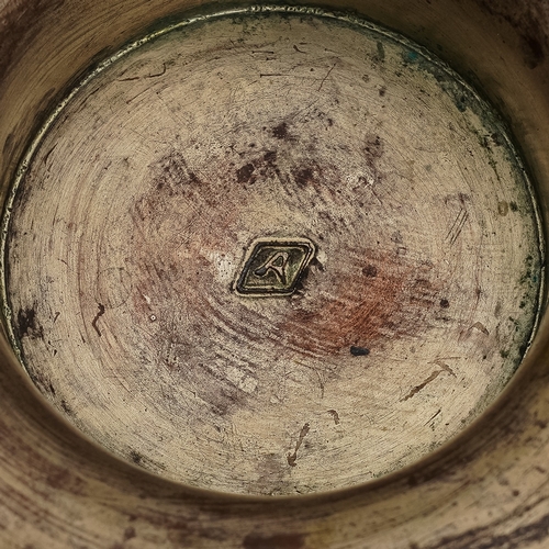 582 - Japanese bronzed pedestal bowl decorated with flowers, marked to base, approx. 18.5 cm in diameter  ... 