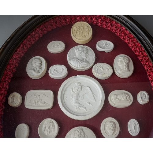 589 - Twenty three 19th Century style Grand Tour plaster intaglios, various sizes depicting Monarchs, clas... 