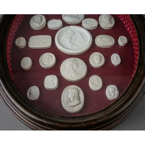 589 - Twenty three 19th Century style Grand Tour plaster intaglios, various sizes depicting Monarchs, clas... 