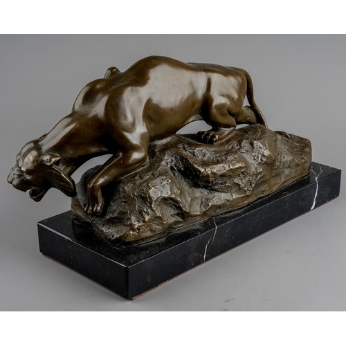 593 - Giacomo Merculiano (1859-1935), a bronze of a crouching snow tiger on rocks signed Merculiano and nu... 