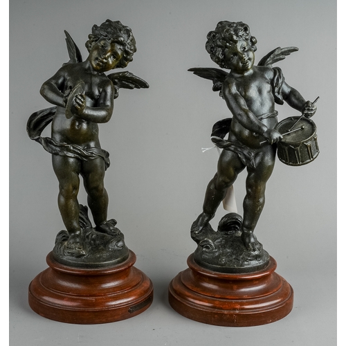 596 - A pair of French decorative bronzed spelter figures of cherubs playing the cymbals or drum, on paint... 