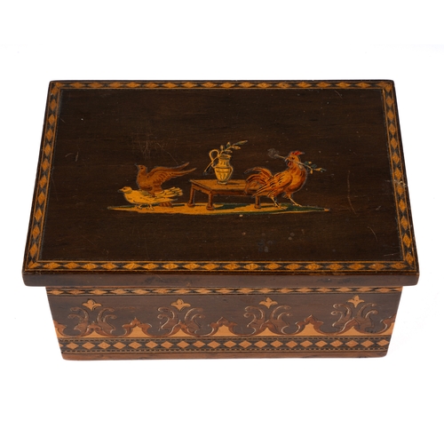 600 - An Italian vari-wood inlaid box, the cover with cockerels and fowl by a table within diamond banding... 