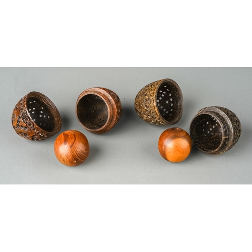 606 - Two 19th Century carved Coquilla Nut Pomanders, approx 6.5cm tall x 4cm wide (2)