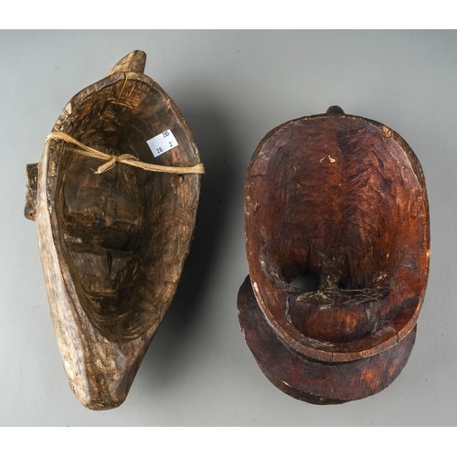 616 - Two antique African tribal masks, the first approx 28cm tall x 14cm wide, the second approx 30cm tal... 