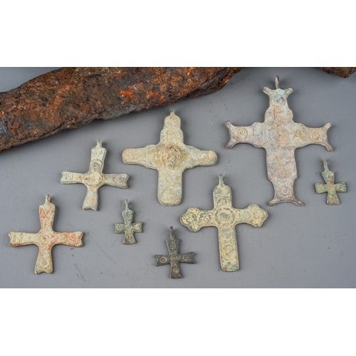 617 - Archaeological interest - metal detecting finds to include an amount of early crosses/crucifixes and... 