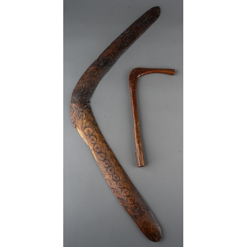 620 - A large collection of 19th century Australian Aboriginal boomerangs, weapons and woomeras