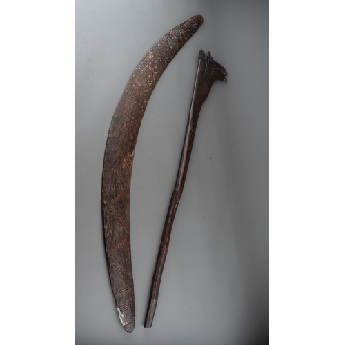 620 - A large collection of 19th century Australian Aboriginal boomerangs, weapons and woomeras