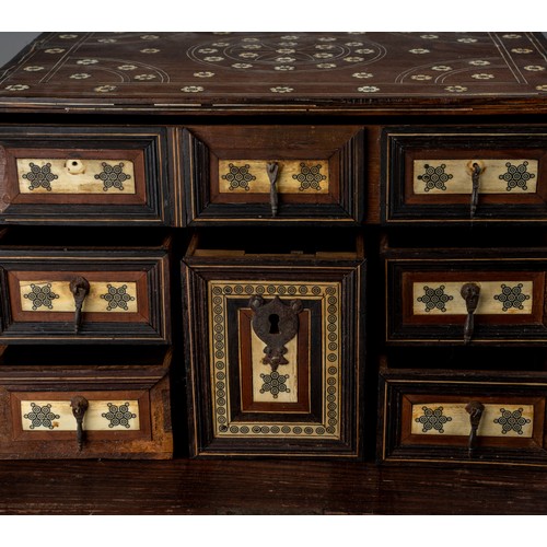 623 - An antique Indo-Portuguese ivory inlaid cabinet / casket. 17th / 18th century with hinged fall front... 