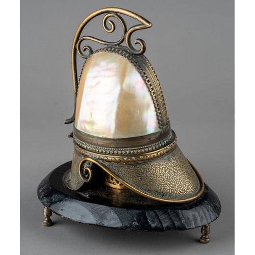 626 - A 19th century French Palais Royale Mother of Pearl perfume holder in the form of a helmet.
The hing... 