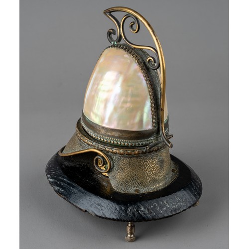 626 - A 19th century French Palais Royale Mother of Pearl perfume holder in the form of a helmet.
The hing... 