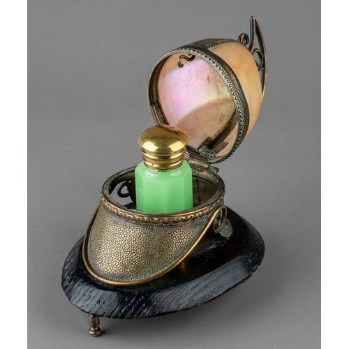 626 - A 19th century French Palais Royale Mother of Pearl perfume holder in the form of a helmet.
The hing... 