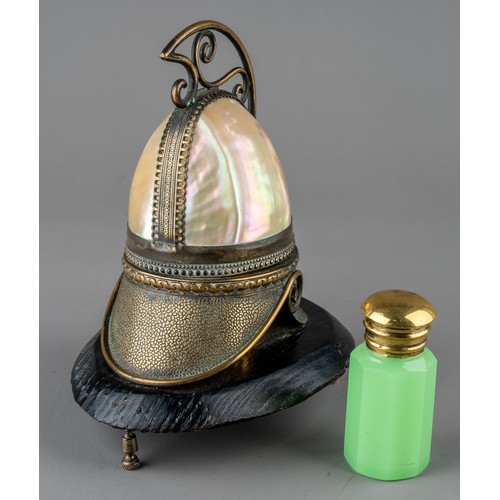 626 - A 19th century French Palais Royale Mother of Pearl perfume holder in the form of a helmet.
The hing... 