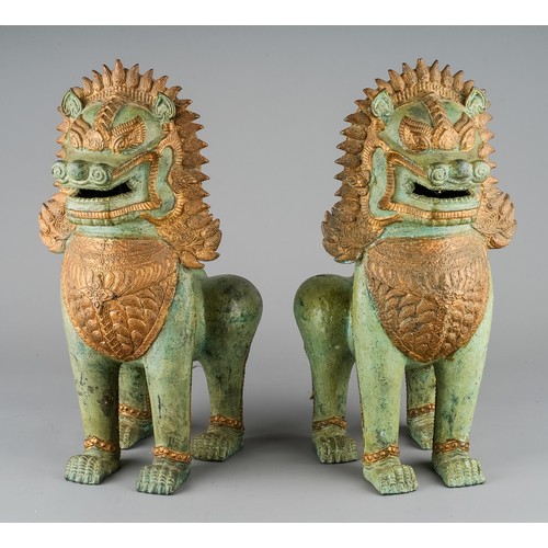 636 - A pair of large cast bronze gilt Singha Temple Lions/Foo Dogs, approx 32cm high