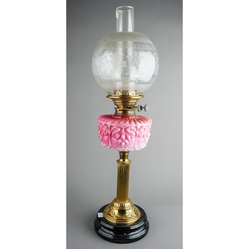 639 - A Victorian style brass oil lamp on reeded column base, with pink moulded glass reserve, etched glas... 