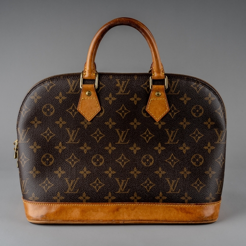 676 - Louis Vuitton - a monogram Alma handbag, the domed shaped satchel designed with maker's classic mono... 