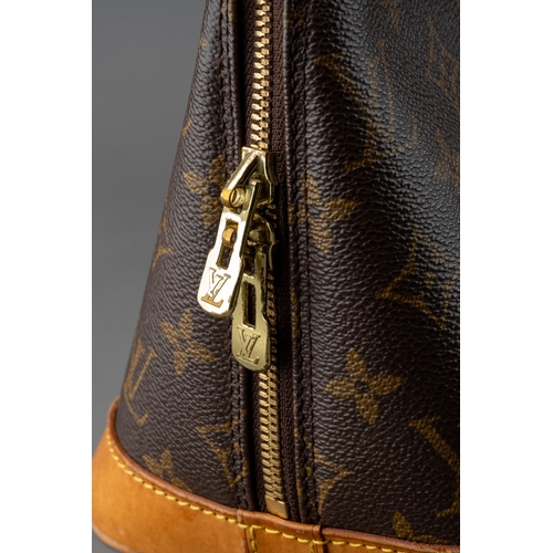 676 - Louis Vuitton - a monogram Alma handbag, the domed shaped satchel designed with maker's classic mono... 