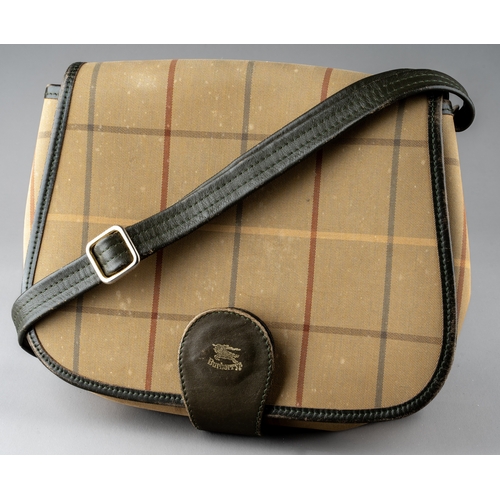 677 - Burberry bags - two canvas saddle bags, both of the same design, to include a beige checked canvas e... 