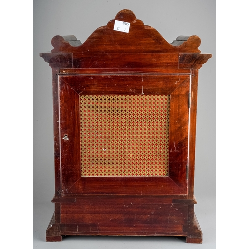 686 - An early 20th Century mahogany cased mantle 8 day clock, the silvered dial with Roman numerals, two ... 