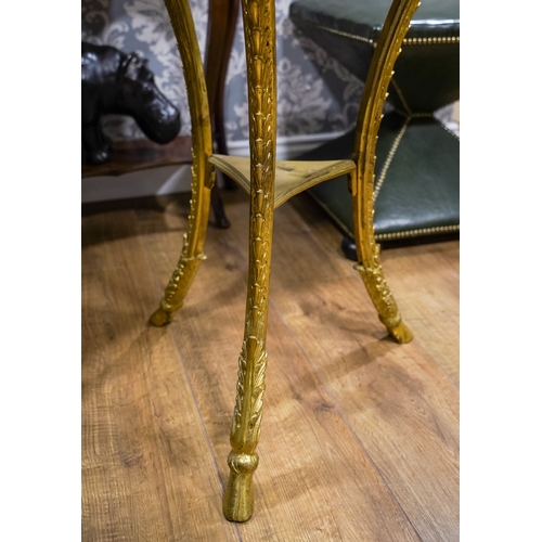 690 - An Italian/French ormolu and marble circular centre table, on three supports with Ram's head termina... 