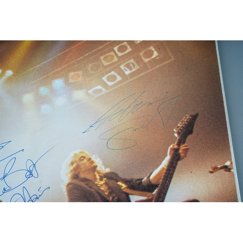 385A - Iron Maiden: World Piece Tour 83 tour book signed with dedication by all members of the band and a W... 