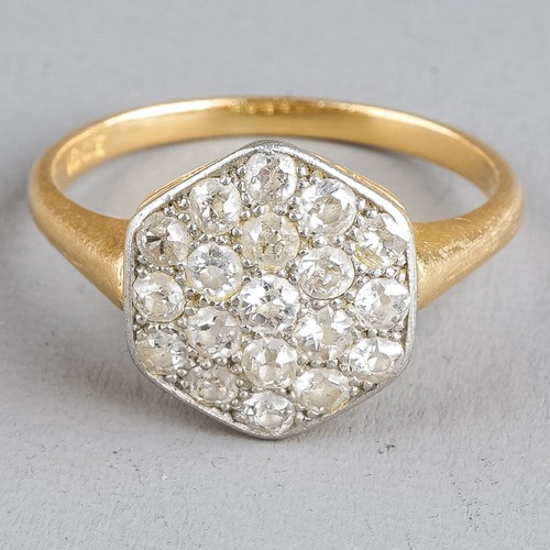 105 - An early 20th century 18ct yellow gold and diamond hexagonal cluster ring, pave-set old-cut diamonds... 