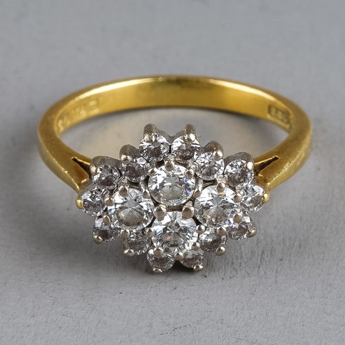 106 - An 18ct yellow gold and diamond oval cluster ring, set with four round brilliant-cut diamonds surrou... 