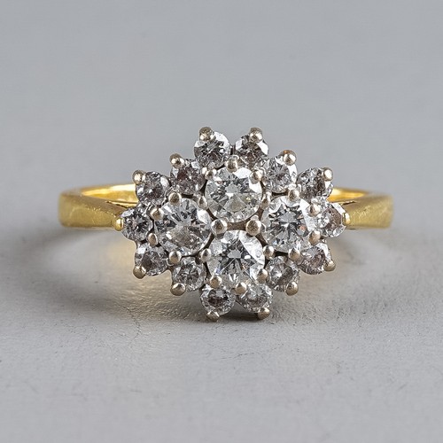 106 - An 18ct yellow gold and diamond oval cluster ring, set with four round brilliant-cut diamonds surrou... 