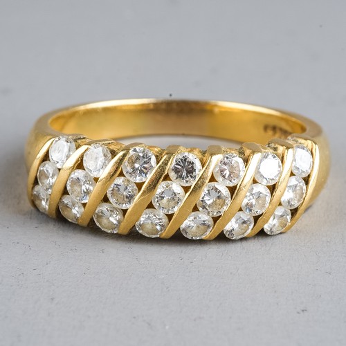 107 - An 18ct yellow gold and diamond ring, set with seven rows of three round brilliant-cut diamonds, est... 