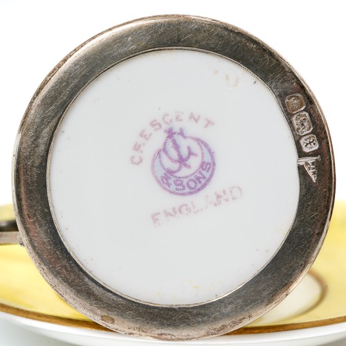 136 - A George V silver mounted Shelley coffee can and saucer, Birmingham 1918, together with a Crescent C... 