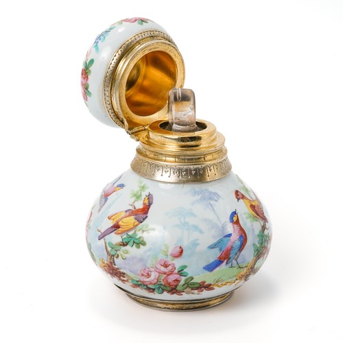 563 - A late 19th/ early 20th century continental porcelain scent bottle, enameled with fanciful birds and... 