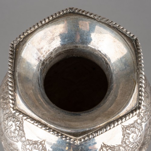 149 - An antique Persian white metal vase, Persian silver hallmarks to the foot rim.

Approx 19cm tall, we... 