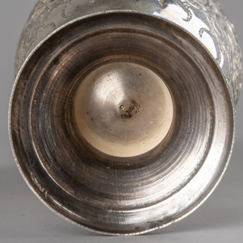 149 - An antique Persian white metal vase, Persian silver hallmarks to the foot rim.

Approx 19cm tall, we... 