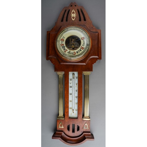 687 - An Arts and Crafts style brass mounted barometer, approx 54cm long