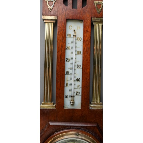 687 - An Arts and Crafts style brass mounted barometer, approx 54cm long