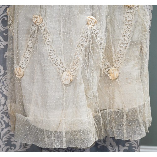 672 - *** PLEASE NOTE REVISED DESCRIPTION: 
A late Victorian white cotton and lace A-line skirt, approx 12... 