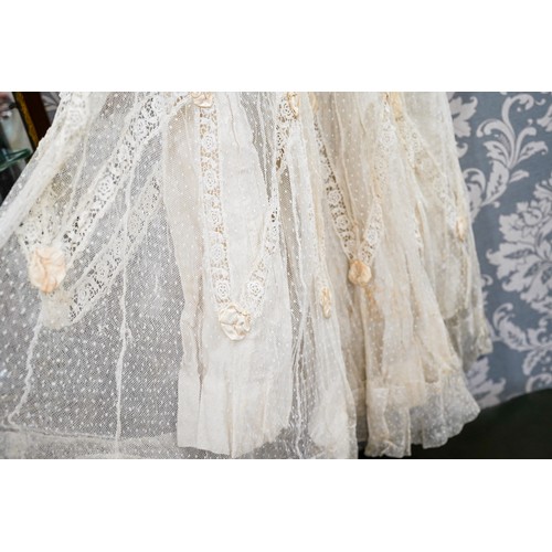 672 - *** PLEASE NOTE REVISED DESCRIPTION: 
A late Victorian white cotton and lace A-line skirt, approx 12... 